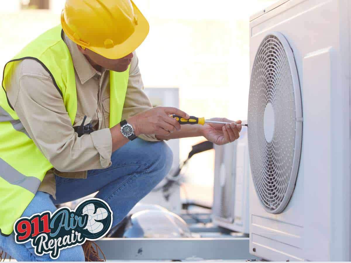 Technician Performing AC Installation On Outdoor Condenser Unit