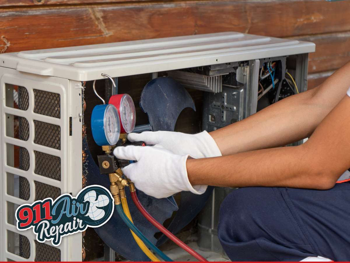 Technician checking an AC unit during installation