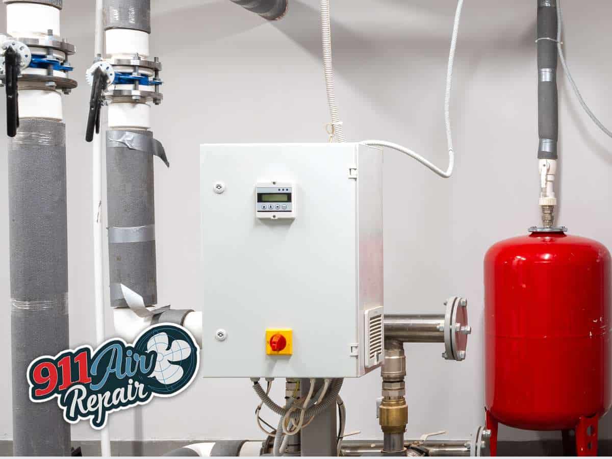 Heating System installation with control panel and pressure tank